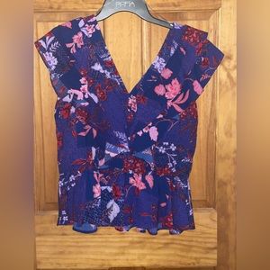 Sleeveless Sofia Vergara blouse